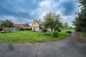 PARDUODAMAS NAMAS SU 29.50 ARŲ ŽEMĖS SKLYPU RUSNĖJE, SODŲ G. 28